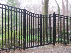 black industrial aluminum fence and gate