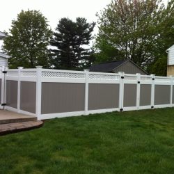beige and white pvc fence panel installation