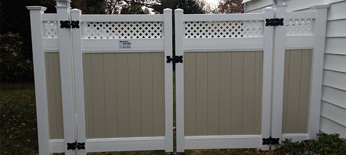 Two-toned privacy fence with lattice top