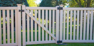 Tan fence and gate for backyard
