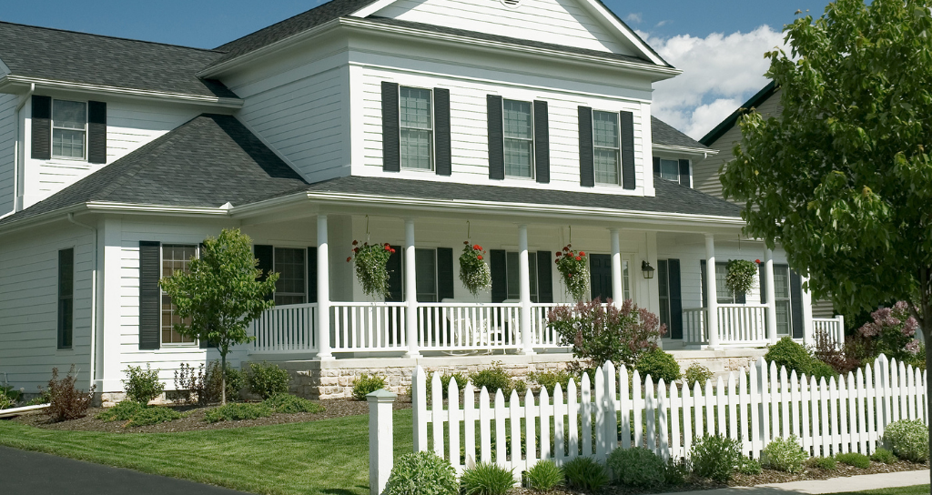 Colonial Home with white Fence Styles