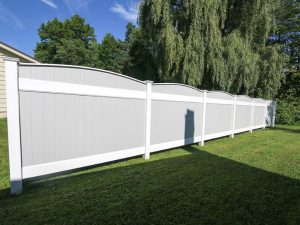 Modern gray curved top vinyl fencing in Lancaster PA