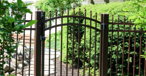 Brown aluminum picket fence gate