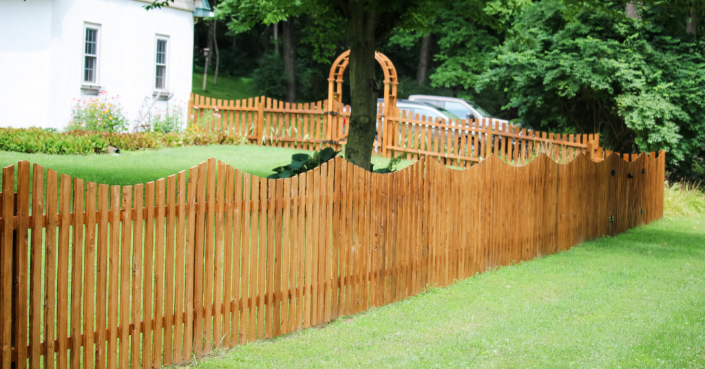 Cedar wood picket fence with arbor