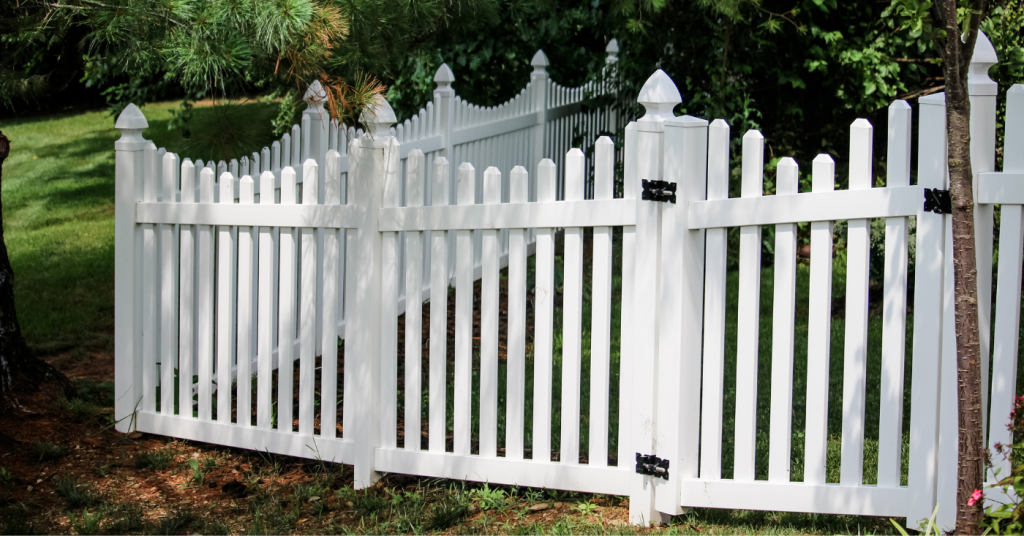 white vinyl picket fence and gate
