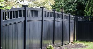 Modern black vinyl privacy fence