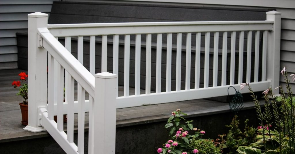 showcasing low maintenance deck railing in white vinyl