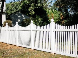 White picket fence with concave top