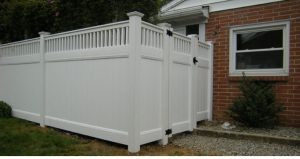 tall white vinyl modern privacy fence with slender gate