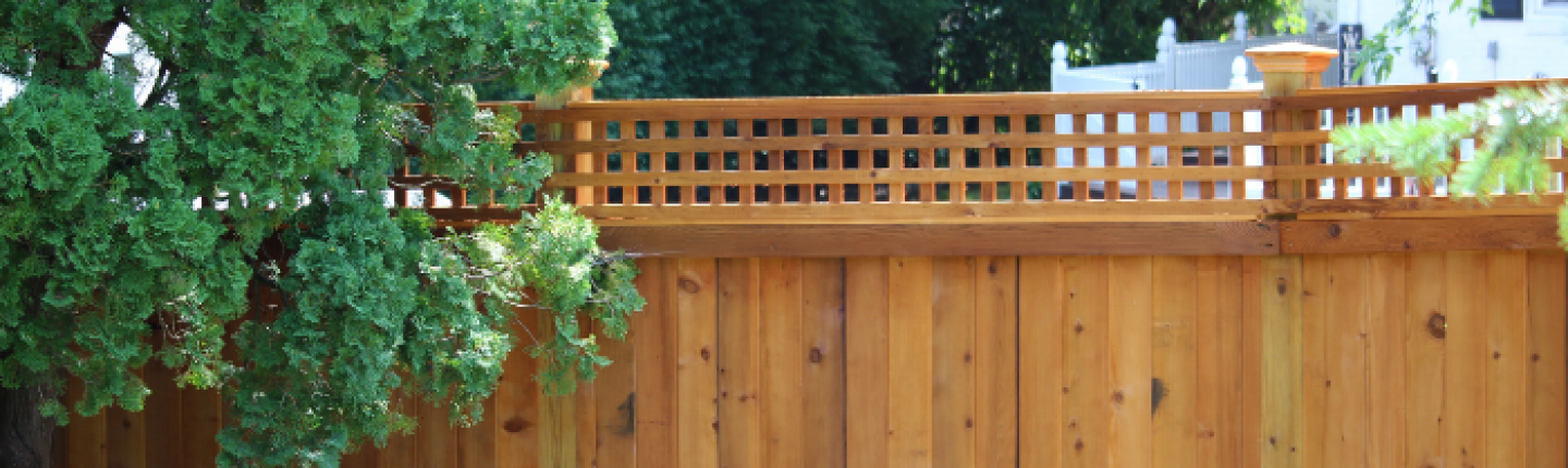 red cedar privacy fencing with lattice top