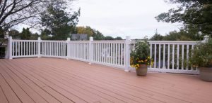 white outdoor railing design surrounding deck with potenza a baluster